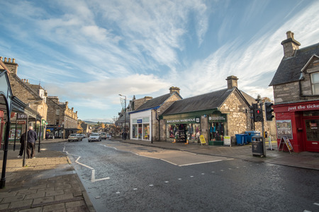 Pitlochry, United Kingdom - 10 November 2017: People walking on the main street in Pitlochry, a burgh in the county of Perthshire in Scotland, lying on the River Tummelのeditorial素材