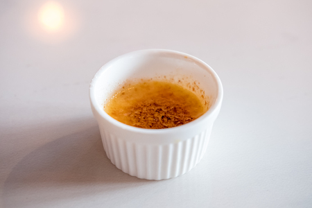 Creme Brulee, also known as burnt cream, a dessert with rich custard base and topped by caramelの写真素材