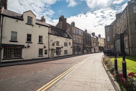 Alnwick, England - 5 August 2017: View of the building in the city of Alnwick, a market town in...
