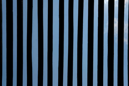 Wooden slat ceiling with sky on the backgroundの写真素材