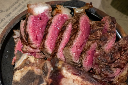 Medium rare Tomahawk meat on plateの写真素材