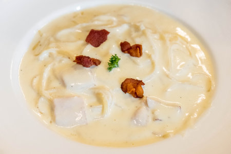 Spaghetti Carbonara served on white plate. Soft Focus