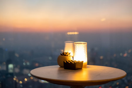 Seating on the terrace of the restaurant with sky view during sunsetの写真素材