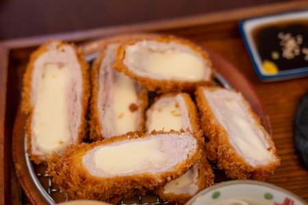Tonkatsu, Fried Pork with cheese serve on plate in restaurantの写真素材