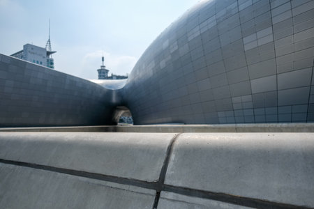 Seoul, South Korea - 10 July 2022: Walkway and Perforated facade cladding of Dongdaemun Design Plaza or DDP. designed by Zaha Hadid and Samooのeditorial素材
