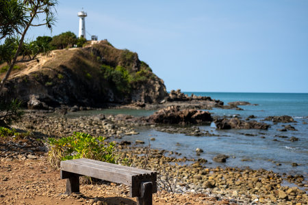 Bench with the view of lighthouse on Koh Lanta. Mu Ko Lanta National Park, Krabi , Thailand.の写真素材