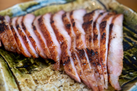Grilled Pork Neck served on wooden plateの写真素材