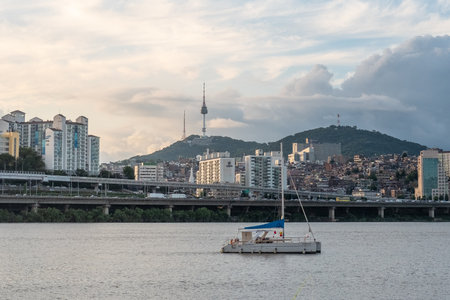 Seoul, South Korea - 14 July 2022 : sky before sunset in downtown Seoul over the Han River, with view of N Seoul Tower or Namsan Towerのeditorial素材