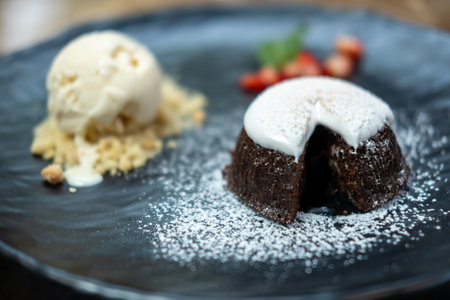Chocolate Lava with whipped cream and ice-creamの写真素材