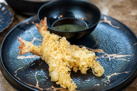 Set of shrimp tempura served on plate on the tableの写真素材