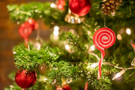 Closeup of Christmas tree decoration ornament with blur bokeh backgroundの写真素材