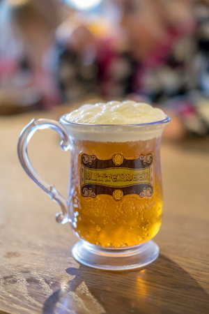 London, England - 18 November 2017:  Butterbeer, famous drink from series Harry Potter. At Warner Brothers Studio tour, The making of Harry Potter at Leavesden Studio in London.のeditorial素材