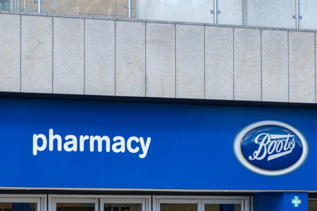 Edinburgh, United Kingdom. 17 March 2017 : Boots, the famous beauty and pharmacy chain in the UK, on Princes Street.The main shopping street in Edinburghのeditorial素材