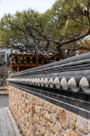 Korean traditional stone wall boundary in Eunpyeong Hanok Village, Seoul, South Koreaの写真素材