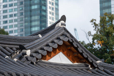 Close-up photo of the Korean style roof in Bongeunsa Temple, a Buddhist temple in Seoul, South Koreaの写真素材