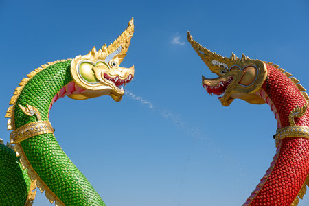 Naga Statues with water flowing. At Wat Saman Rattanaram, Chachoengsao , Thailandの写真素材