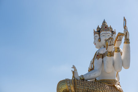 Hindu God Brahma statue, against the blue sky at Wat Saman Rattanaram. Chachoengsao , Thailandの写真素材