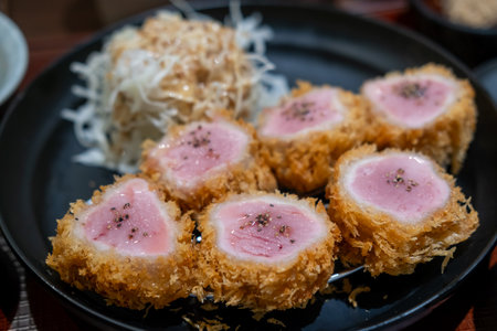 Sous vide pork katsu. Tonkatsu, Fried Pork serve on plate in restaurantの写真素材