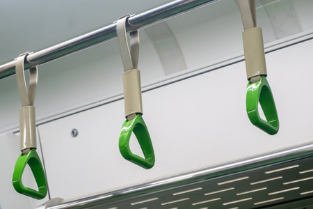 Interior view of the subway with hand grip, in Seoul, South Koreaの写真素材