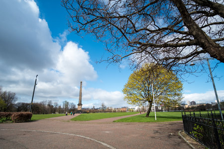 People walking in Glasgow Green. It is the oldest public park in Glasgow, United Kingdom.