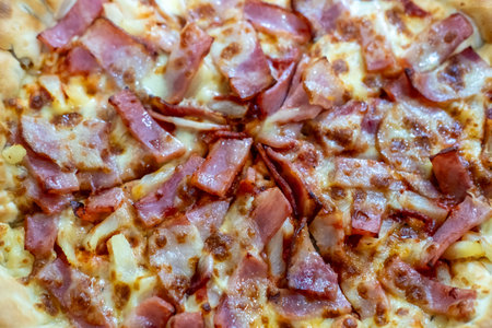 Close up of bacon and cheese pizzaの写真素材