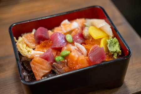Donburi, a Japanese rice bowl dish of seafood. Including raw fish such as sliced salmon, and tuna.の写真素材
