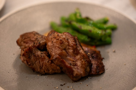 Medium rare steak served on plateの写真素材