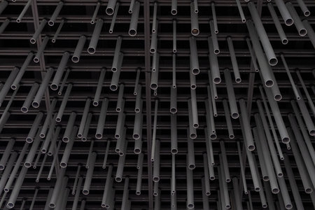 Suspended aluminum pipes, abstract tube for background.
