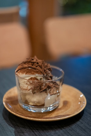 Square Tiramisu served in a cup in the cafe