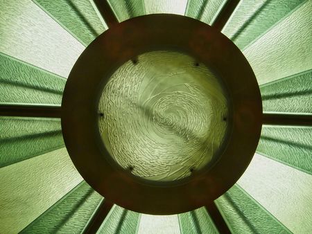 A modern glass skylight that is in a ceilingの写真素材