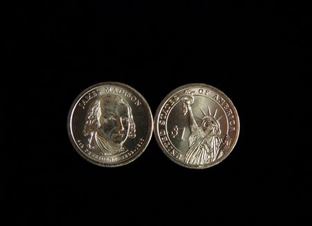 A one dollar James Madison and statue of liberty US coinの写真素材