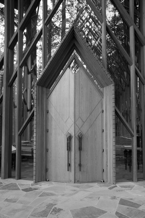 Black and white image of two wooden doorsの写真素材