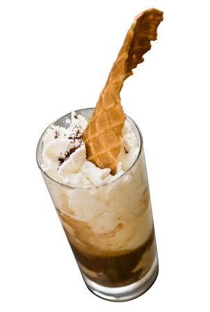 Close up on a glass full of ice cream and whipped cream isolated on white. Freshness, relaxing, summer concept.の写真素材