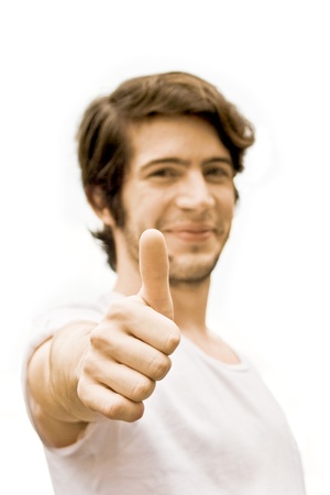 Young happy man is showing his hand with the thumb up  Success, positive concept  Isolated on white background の写真素材