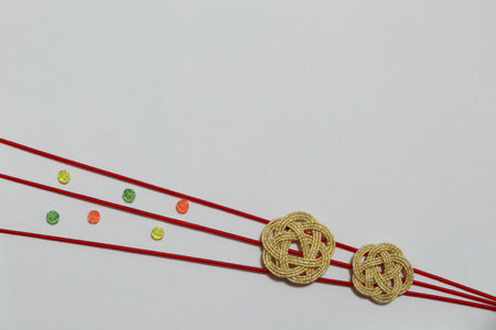 Handmade Japanese ornaments (MIZUHIKI) with copy space.の写真素材