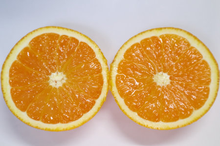 Orange fruit on a white background. Close-up. Macro.の写真素材