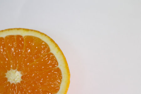 Orange fruit slice isolated on white background with copy space for text.の写真素材