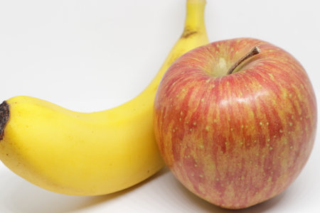 Apple and Banana with white background.の写真素材