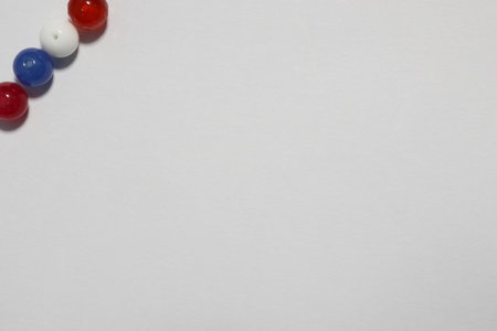 Colorful beads with white background.