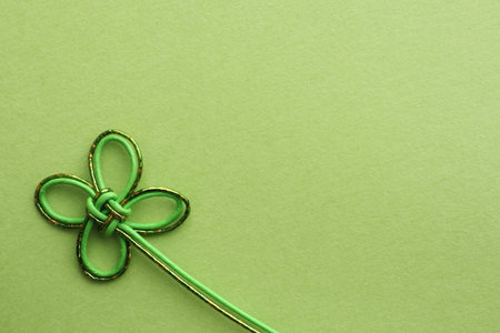 Clover shape ornament with yellow green color background. With place for text.の写真素材