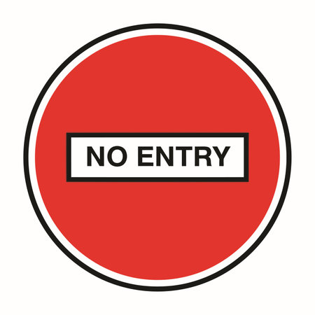 A standard red circular traffic sign with a horizontal white bar containing the text NO ENTRY. Used...