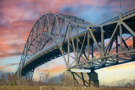 Cable-stayed bridge over the Vistula river at sunset.の写真素材