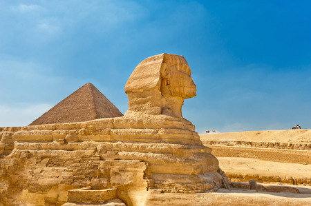 The Sphinx with Pyramid in background, Egypt Cairoの写真素材