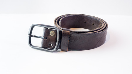 old Belt brown on white backgroundの写真素材