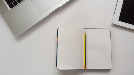 workspace desk with  notebook and laptop copy space background  whiteの写真素材
