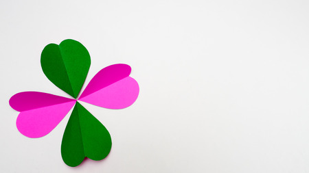 paper heart pink and green on white backgroundの写真素材