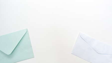 Office desk table with  envelope and glasses close up Top view copy spaceの写真素材