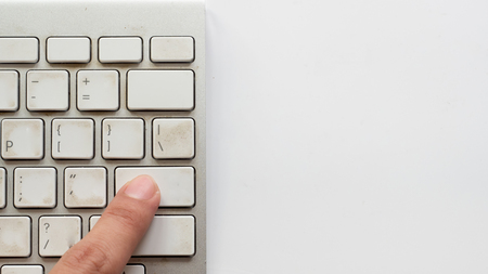 Office desk table keyboard on white backgroundの写真素材
