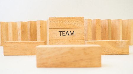 wooden block concept team work  on white backgroundの写真素材