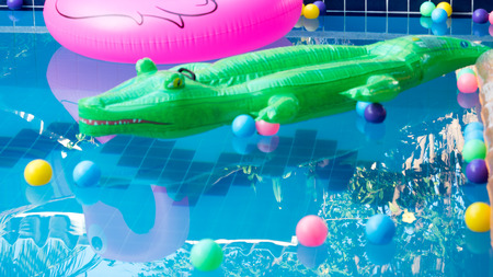 Swimming Equipment in pool blur backgroundの写真素材